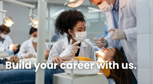 Dental professionals examining a patient in a clinic. Text overlay reads, "Build your career with us."